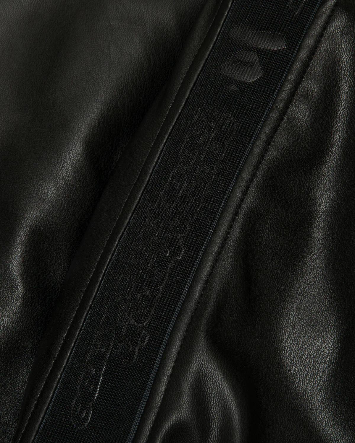 Moonface logo faux leather hooded jacket