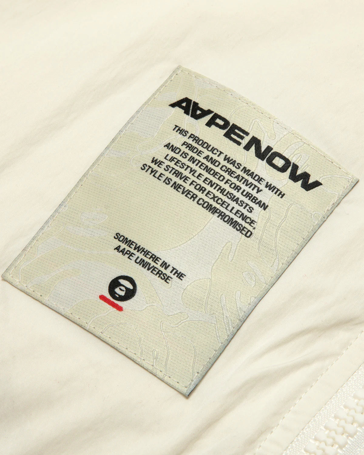 AAPE NOW moonface logo puffer jacket