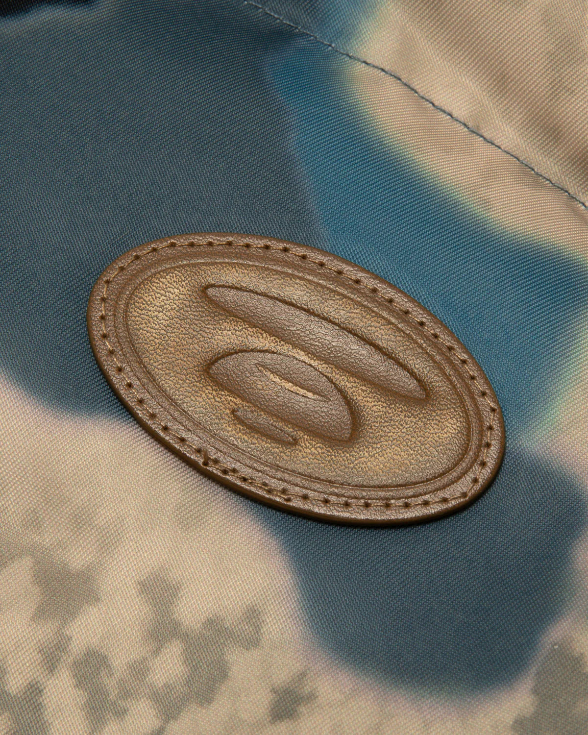 Moonface logo camo puffer jacket