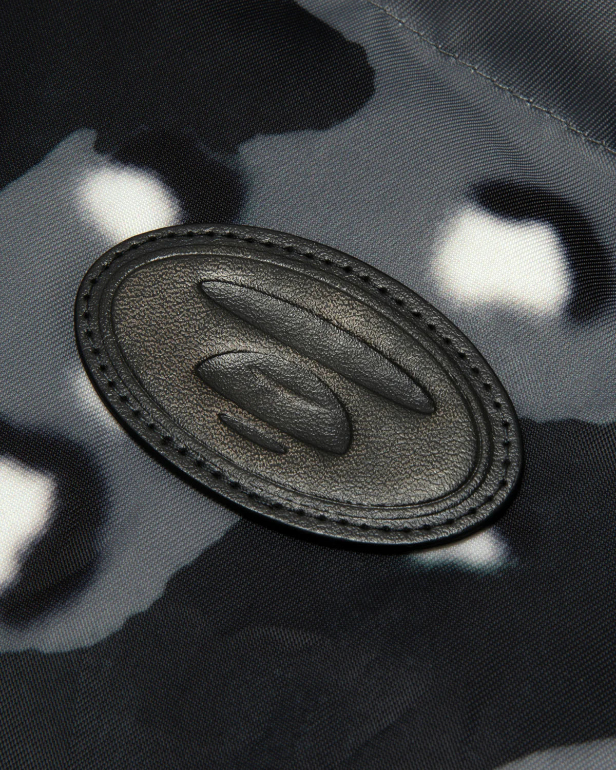 Moonface logo camo puffer jacket