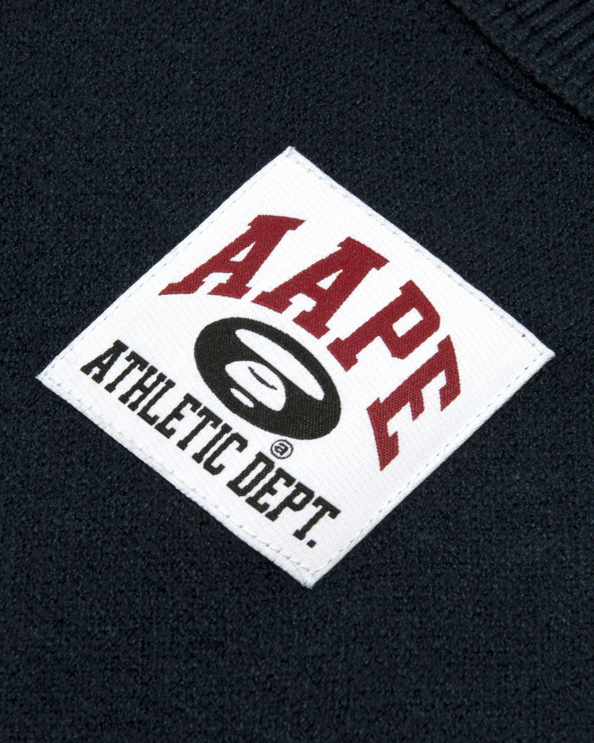 AAPE UNVS moonface logo crew neck knit sweatshirt