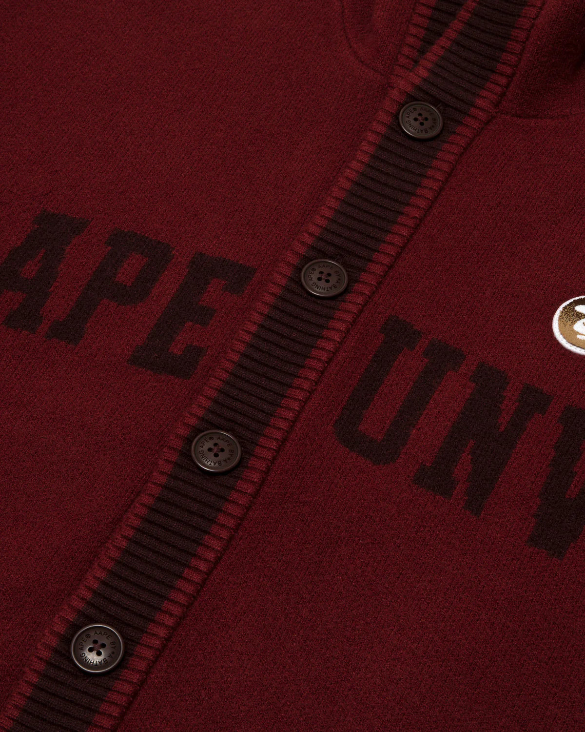 AAPE UNVS moonface logo hooded cardigan