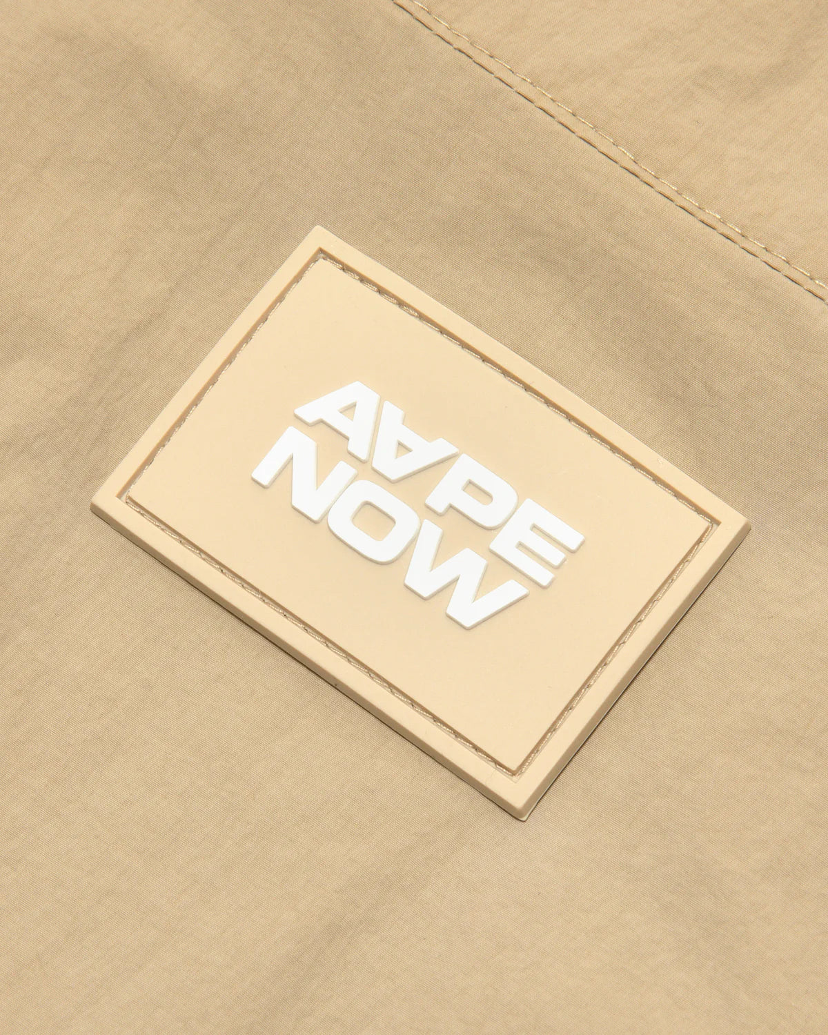 AAPENOW moonface logo windbreaker jacket