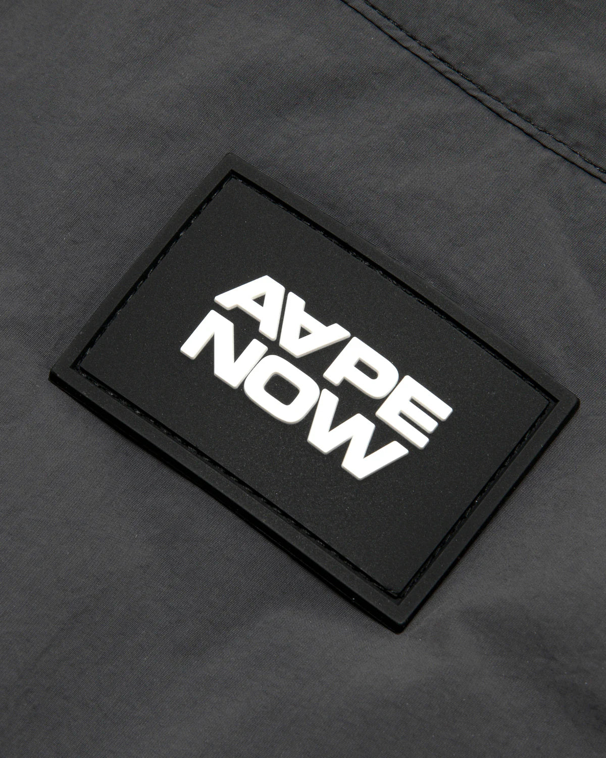 AAPENOW moonface logo windbreaker jacket