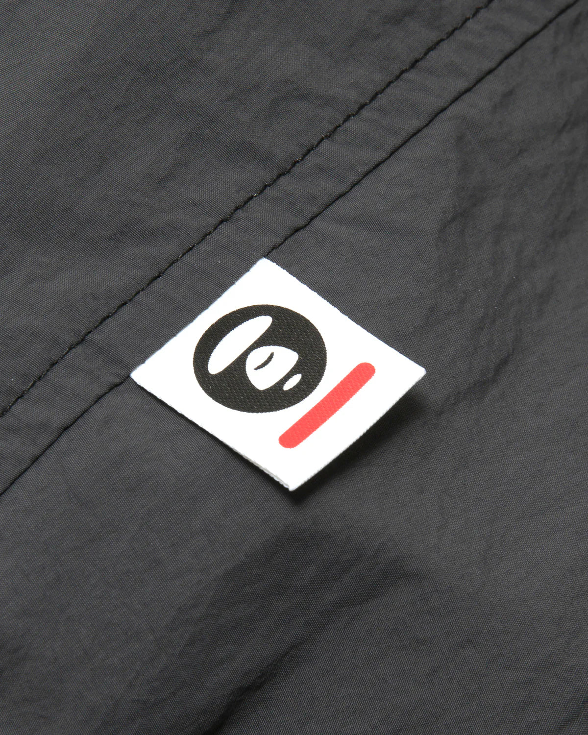AAPENOW moonface logo windbreaker jacket