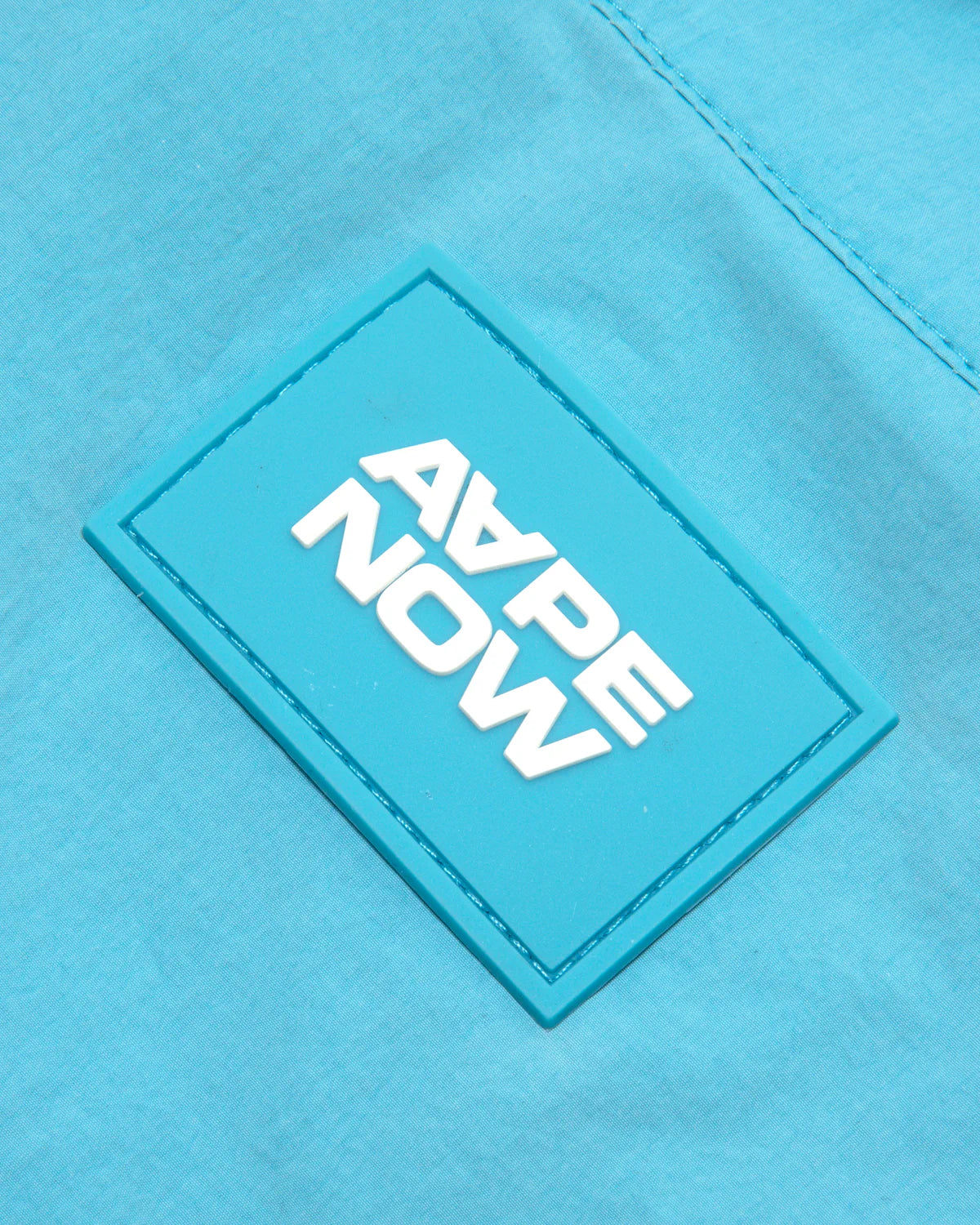 AAPENOW moonface logo windbreaker jacket