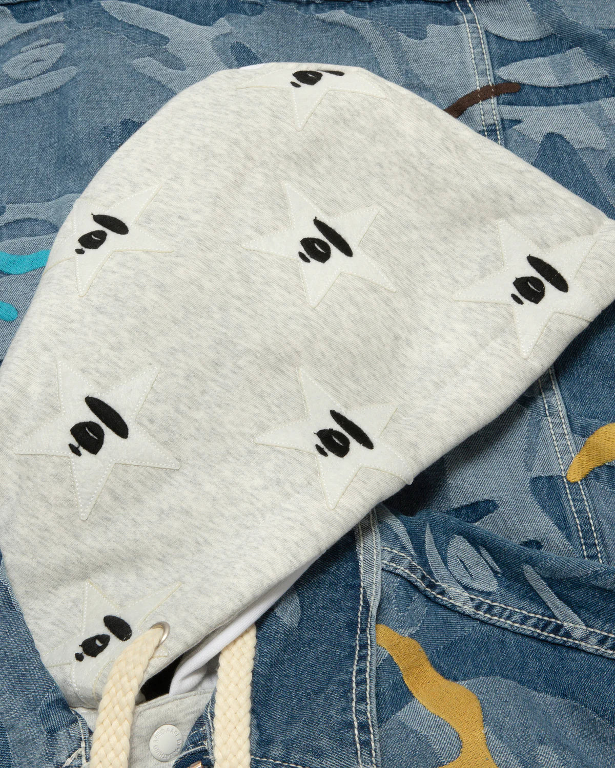 Moonface logo camo hooded denim jacket