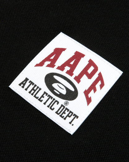 A patch polo shirt