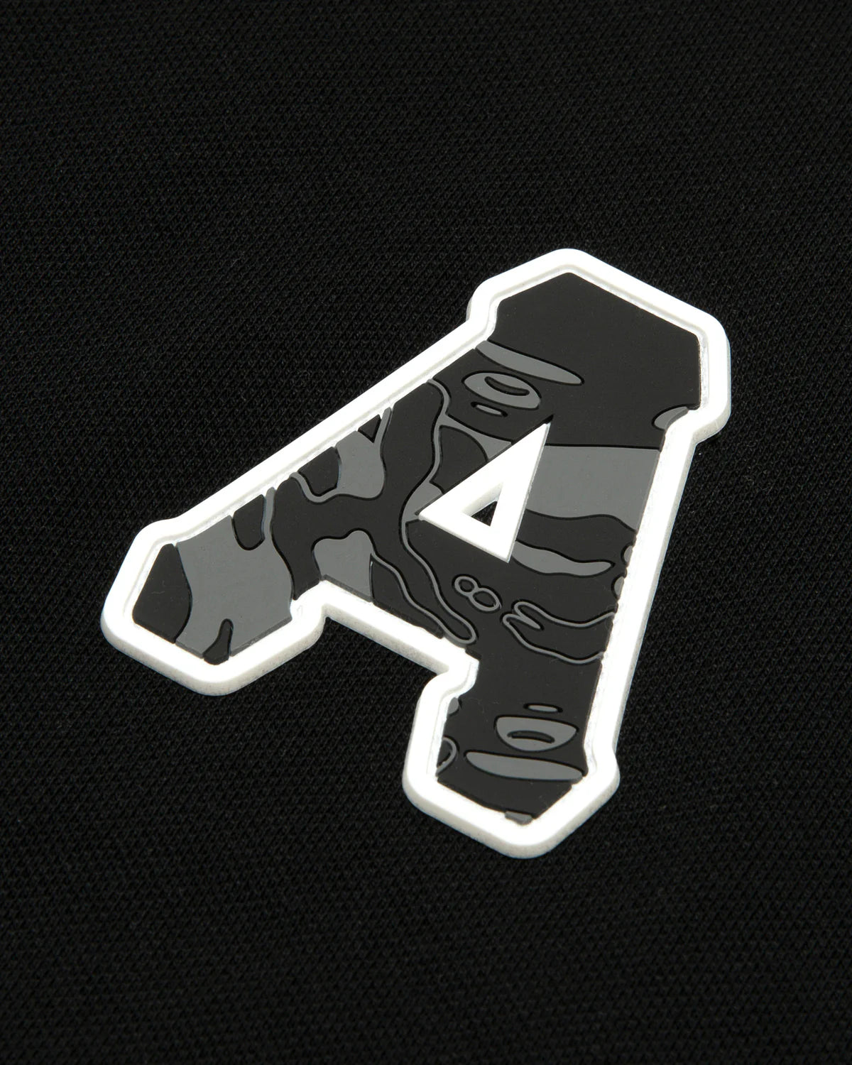 A patch polo shirt