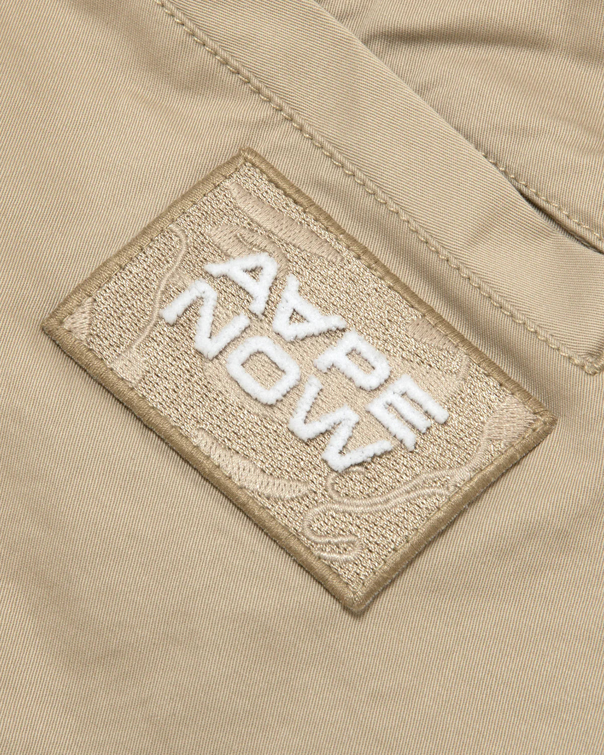 AAPENOW moonface logo tapered jogger pants