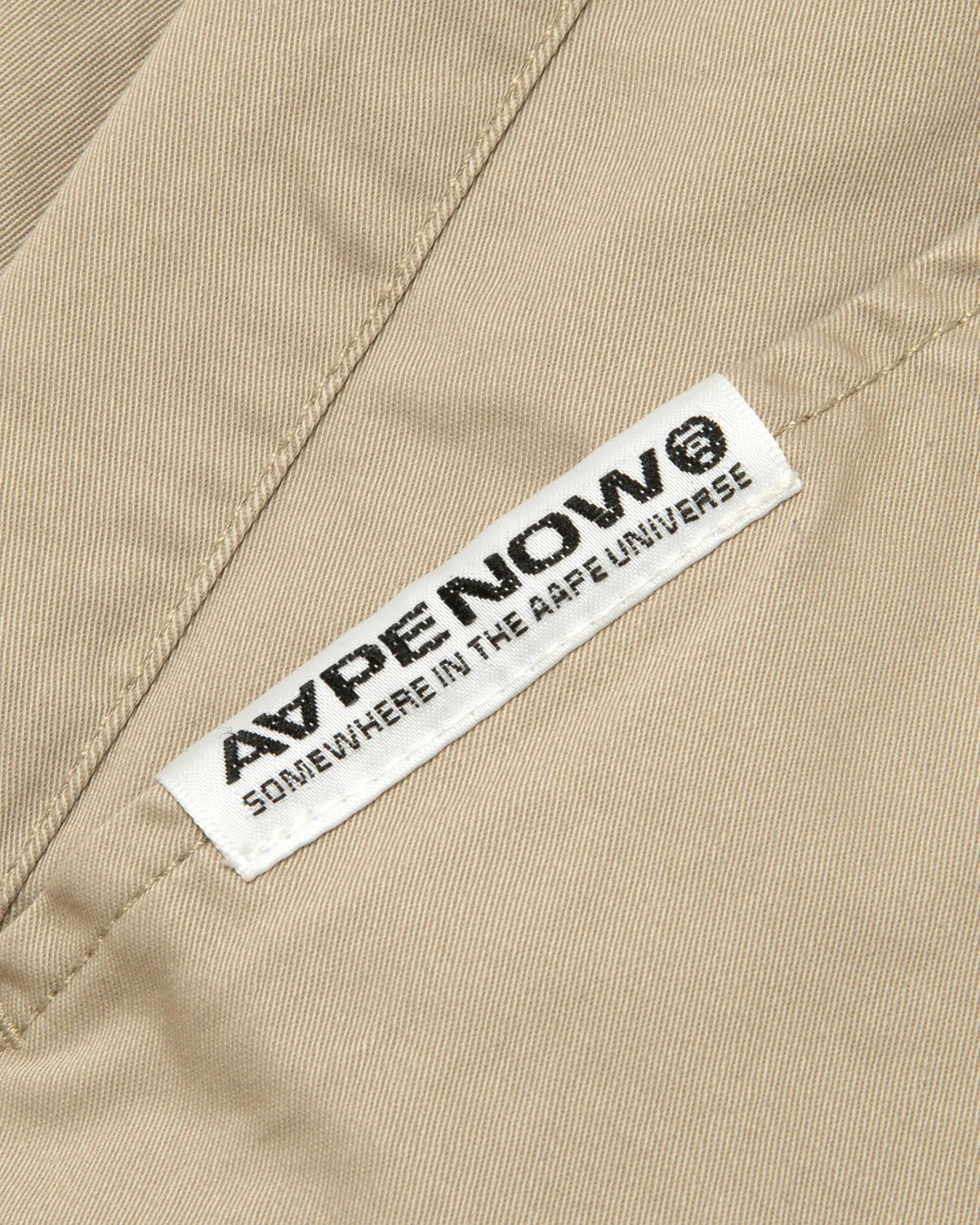 AAPENOW moonface logo tapered jogger pants