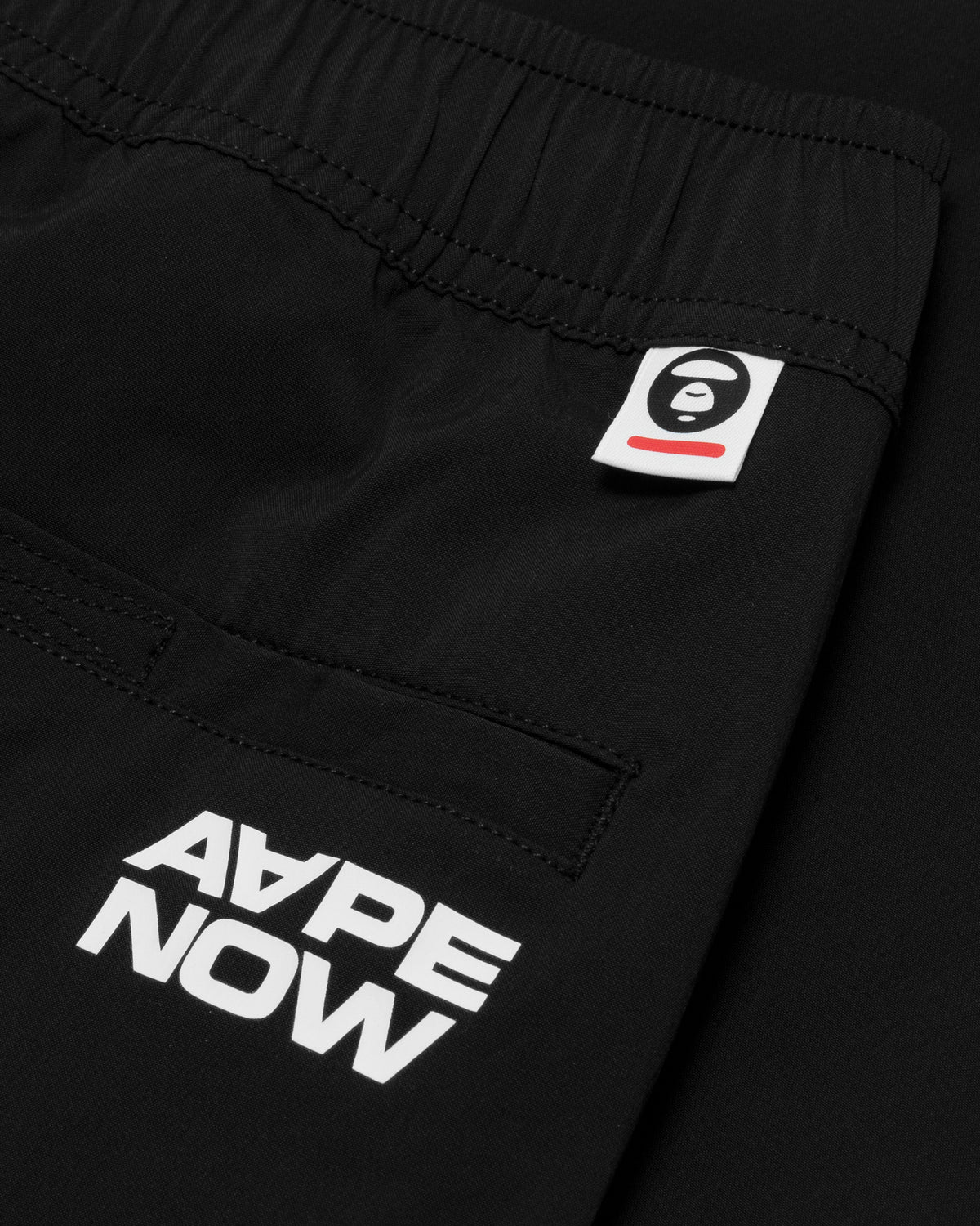 AAPENOW moonface logo jogger pants
