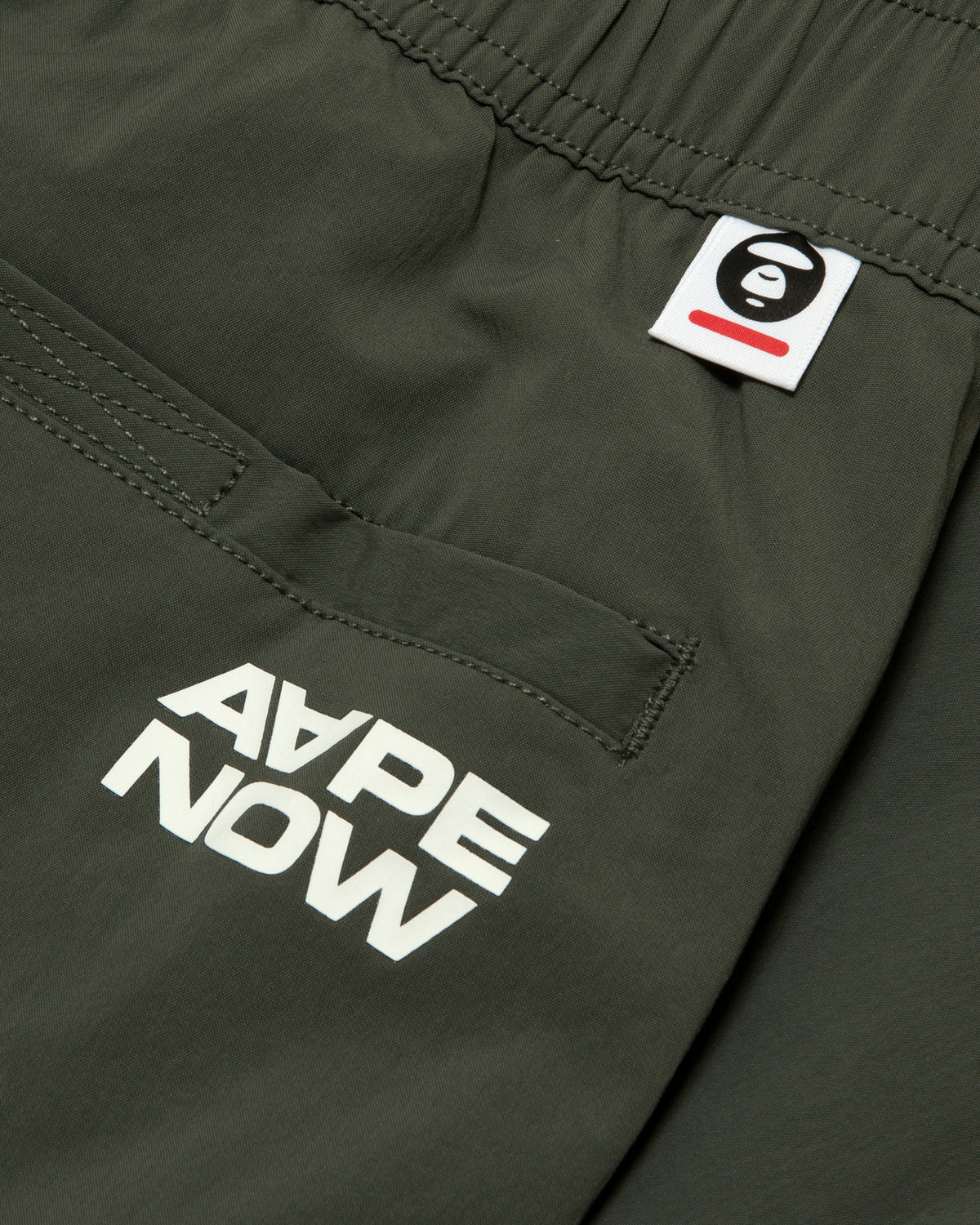 AAPENOW moonface logo jogger pants