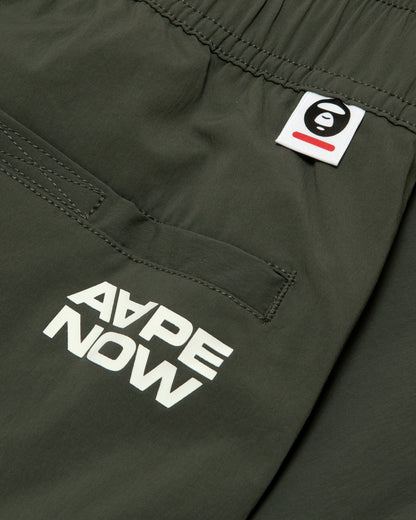 AAPENOW moonface logo jogger pants