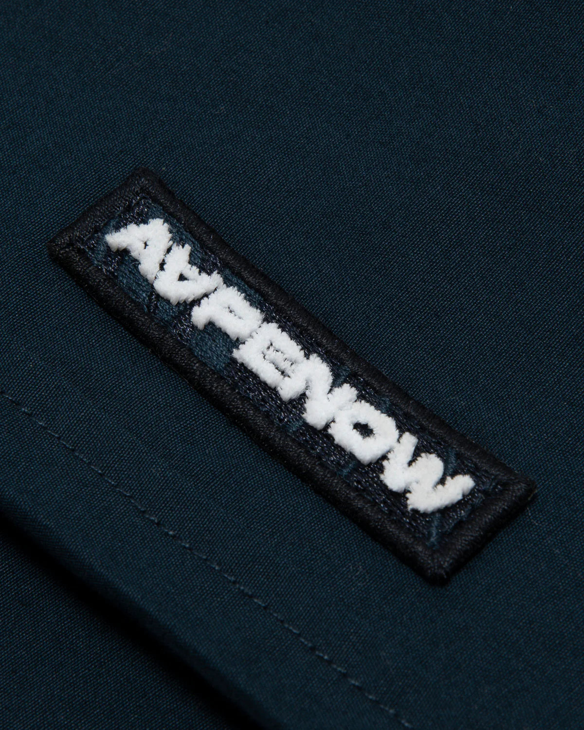 AAPENOW moonface logo pants