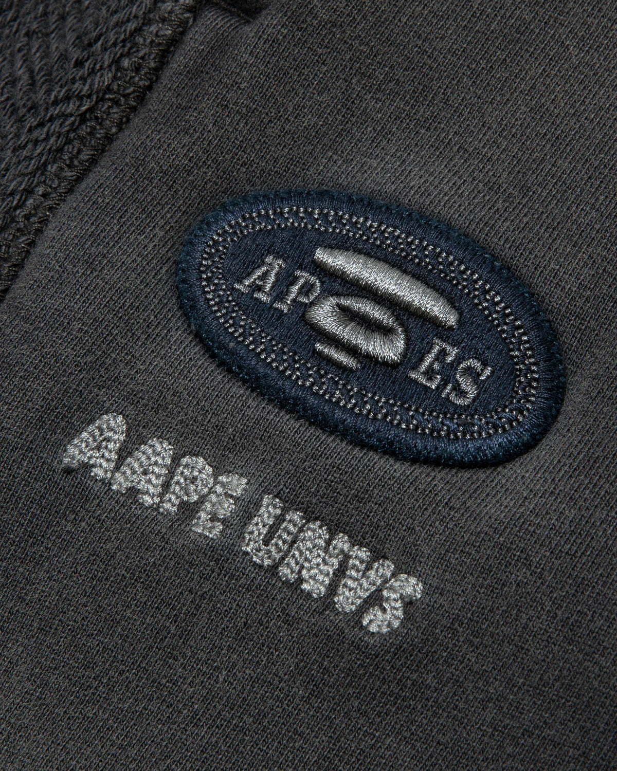 AAPEUNVS moonface logo sweat pants