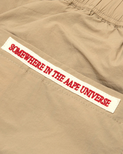 AAPEUNVS moonface logo patch shorts