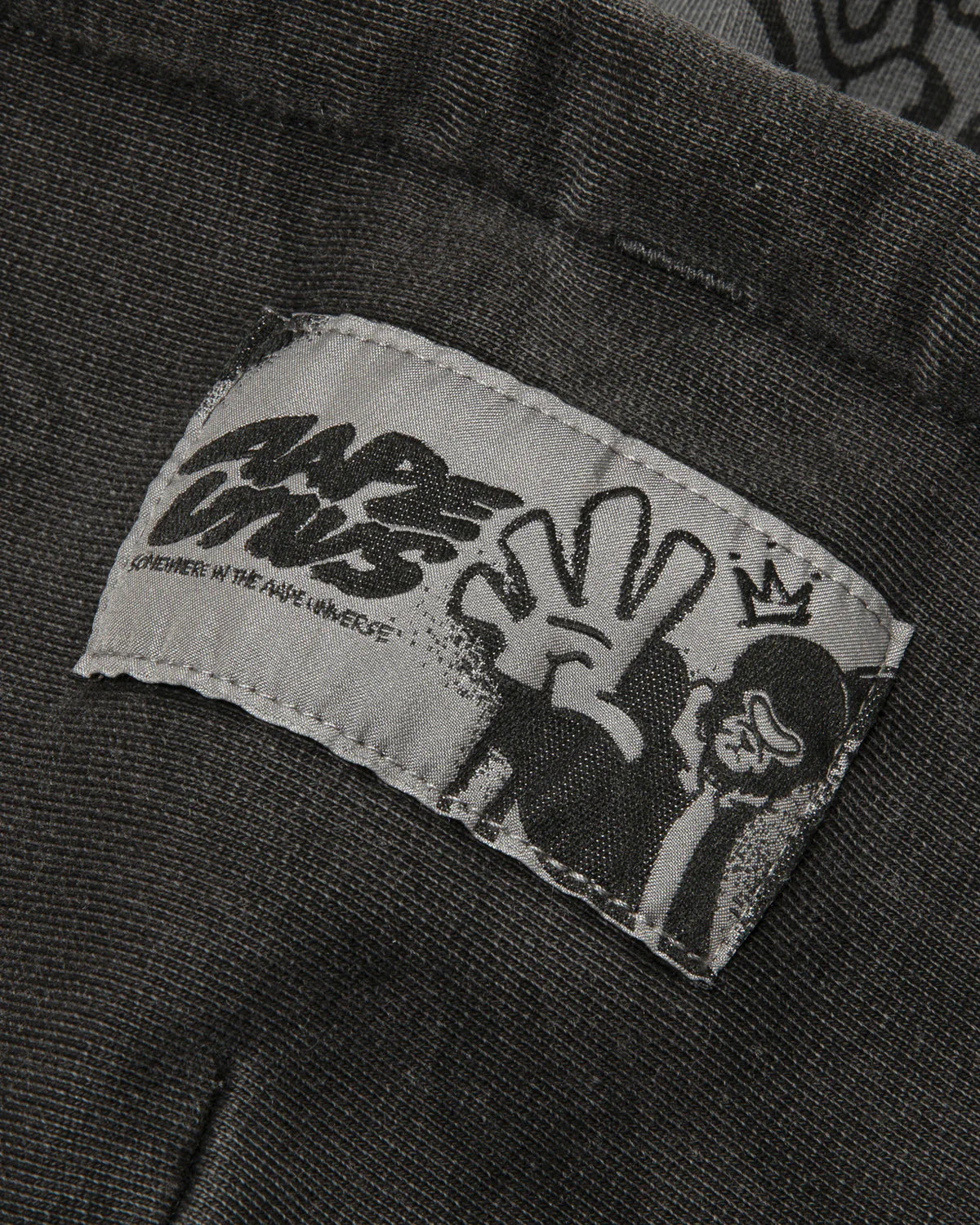 AAPEUNVS graffiti print zip-up hoodie